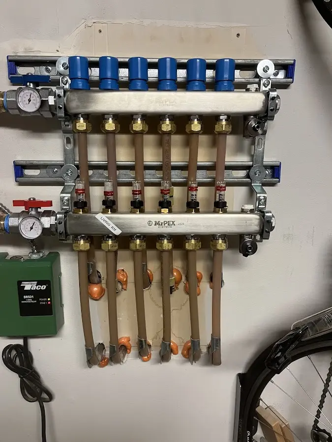 Plumber performing Water Heater Repair at a residential property in Rosemont